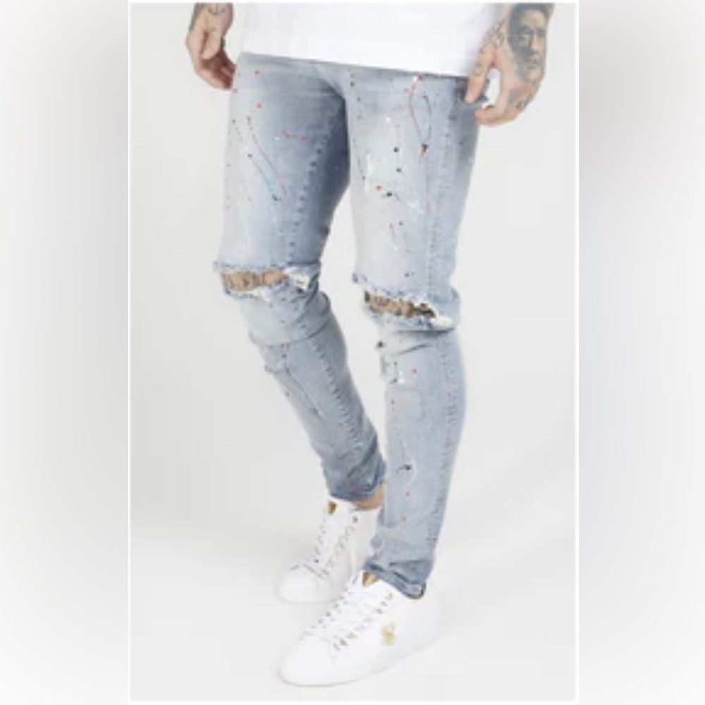 Sik Silk Bust Knee Riot Denim Jeans in Light Blue.  Size Medium